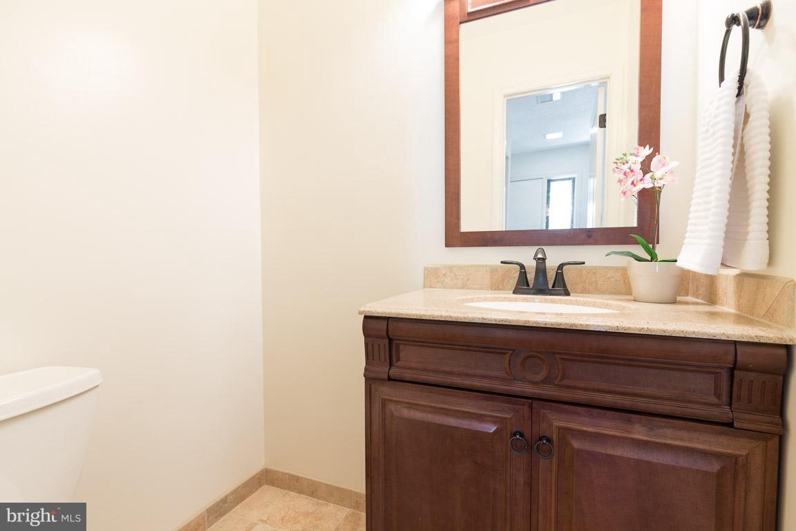 2104 Cartwright Place Reston, VA 20191 - Photo 13 of 30 Main level powder room updated in 2014