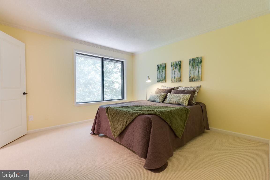 2104 Cartwright Place Reston, VA 20191 - Photo 21 of 30 Large master bedroom with walk-in closet