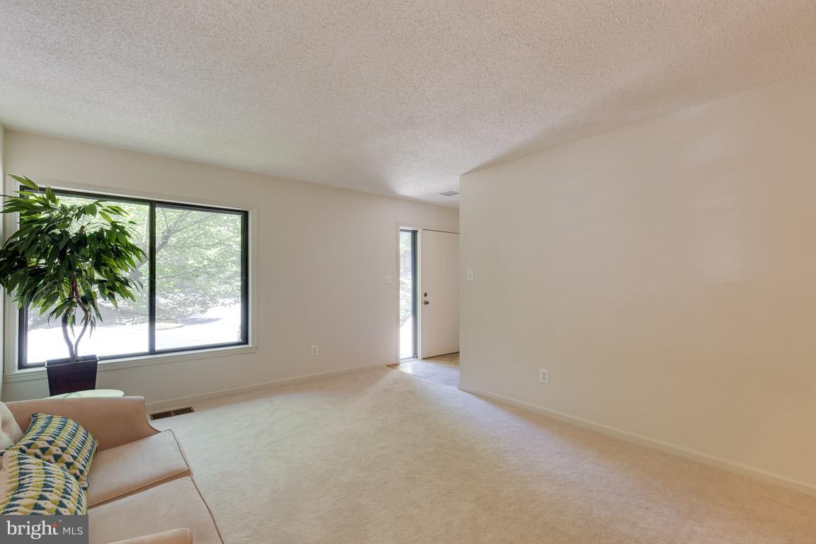 2104 Cartwright Place Reston, VA 20191 - Photo 5 of 30 Powder room and coat closet off foyer
