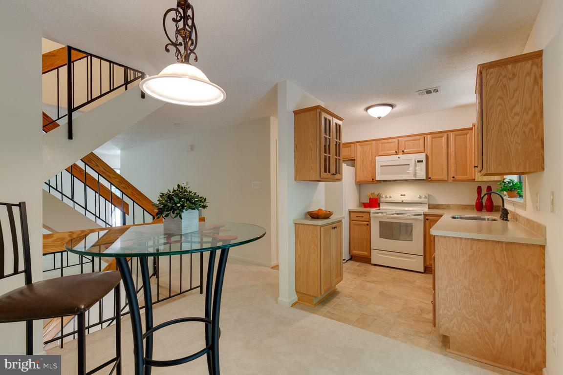 2104 Cartwright Place Reston, VA 20191 - Photo 6 of 30 Enjoy the open flow throughout.