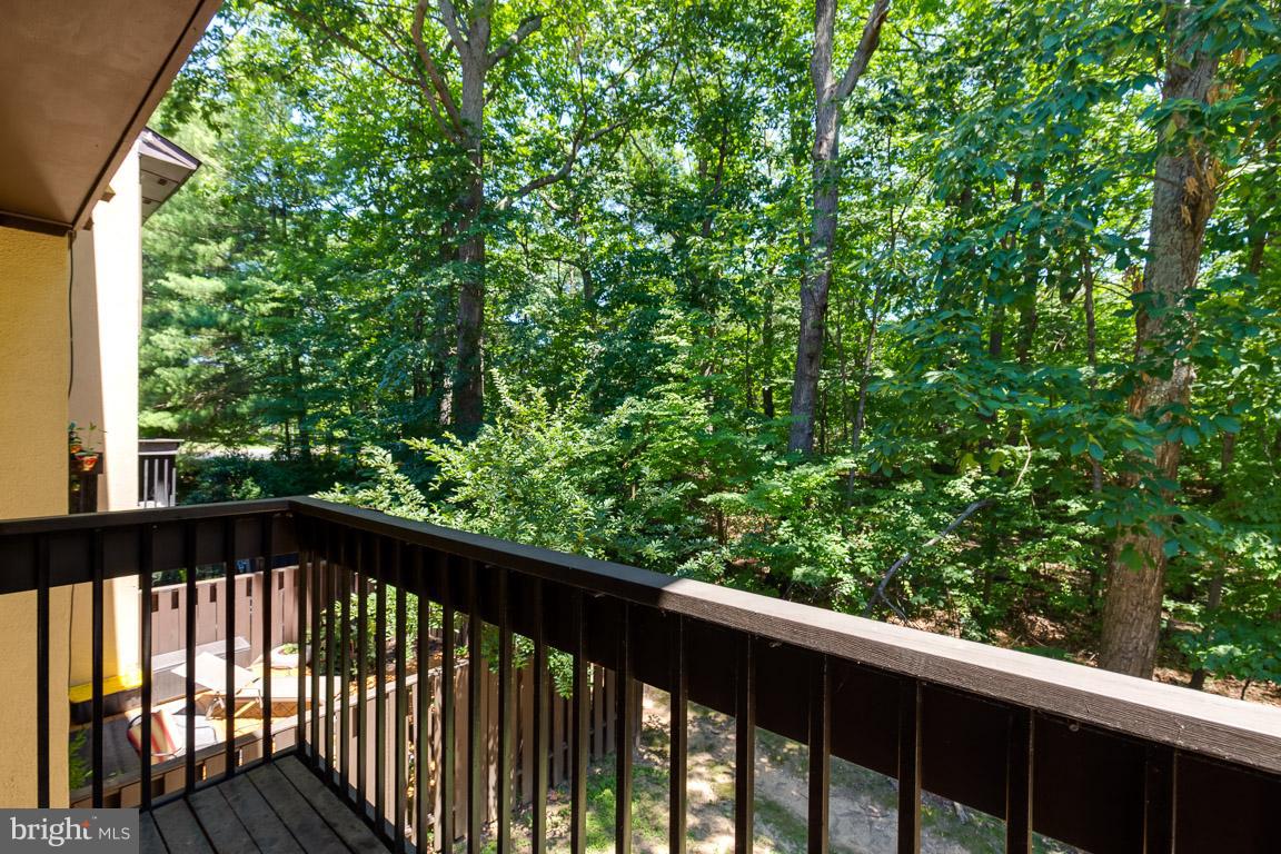 2104 Cartwright Place Reston, VA 20191 - Photo 8 of 30 Wooded common area views from balcony