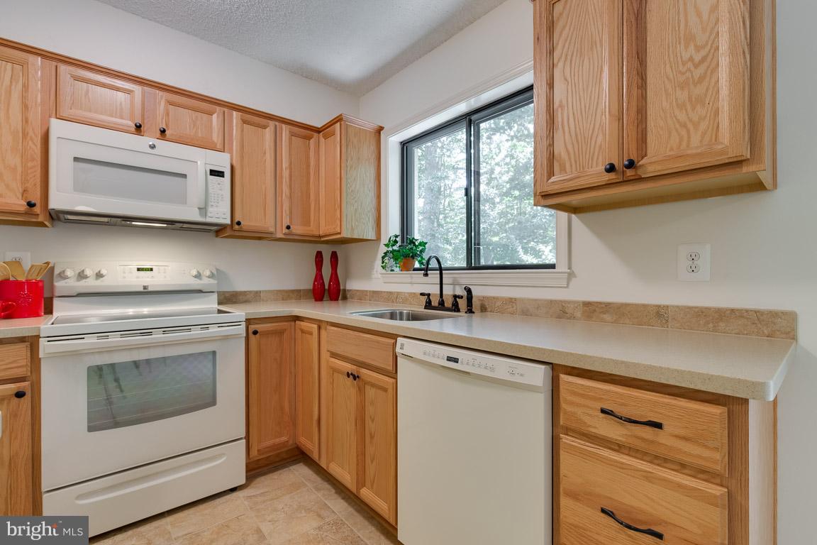 2104 Cartwright Place Reston, VA 20191 - Photo 10 of 30 Kitchen updated in 2014; Corian counter tops