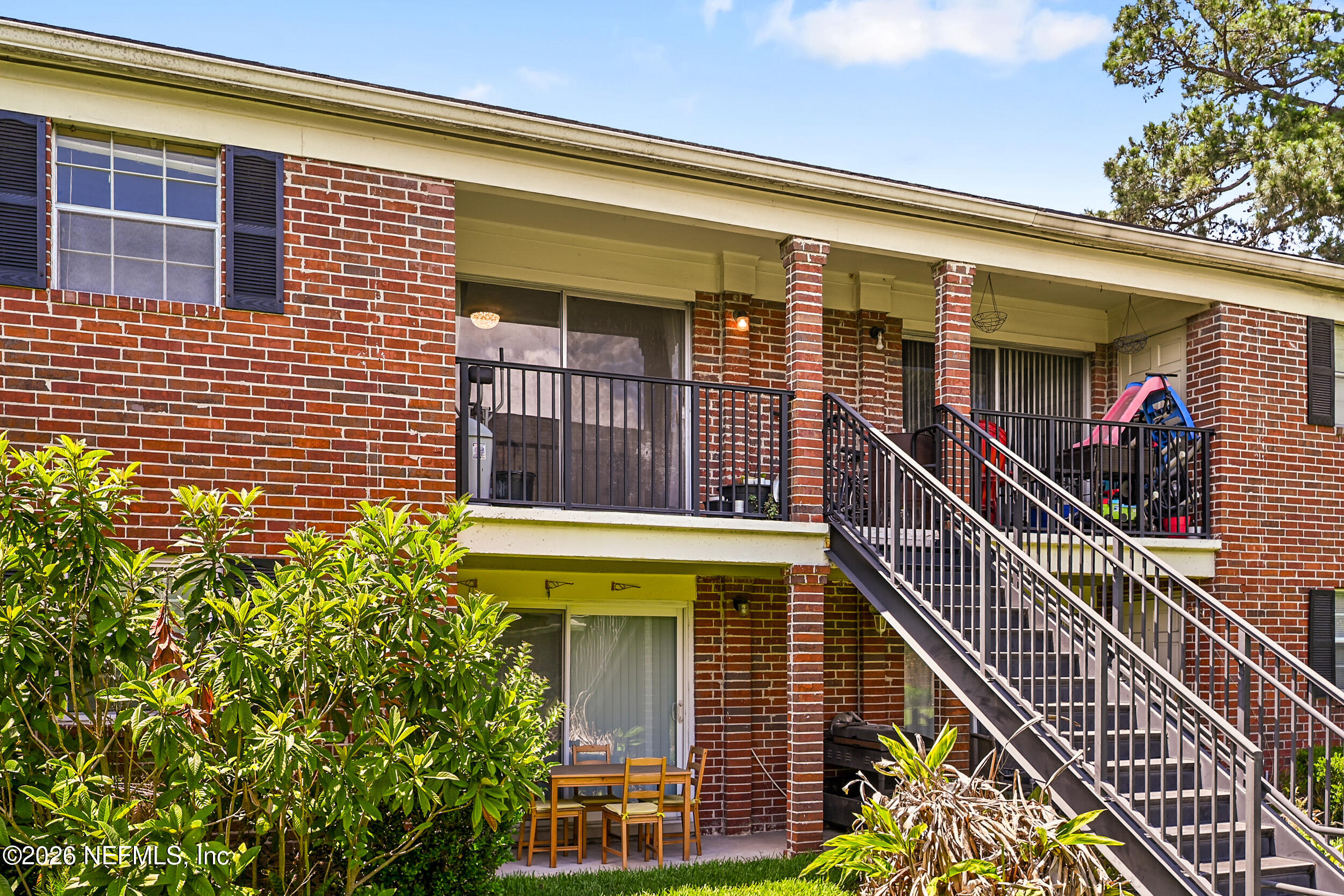 4915 Baymeadows Road, Unit 6G Jacksonville, FL 32217 - Photo 34 of 44 a front view of a building with glass windows