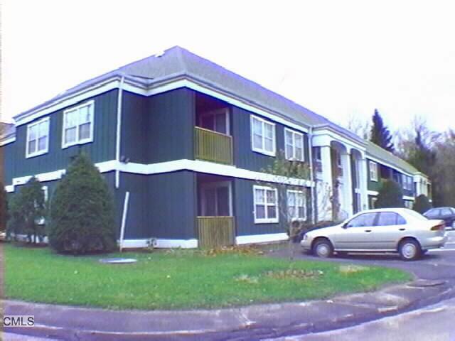 10 Scuppo Road, Unit B6 Danbury, CT 06811 - Photo 1 of 1 a couple of cars parked in front of a house