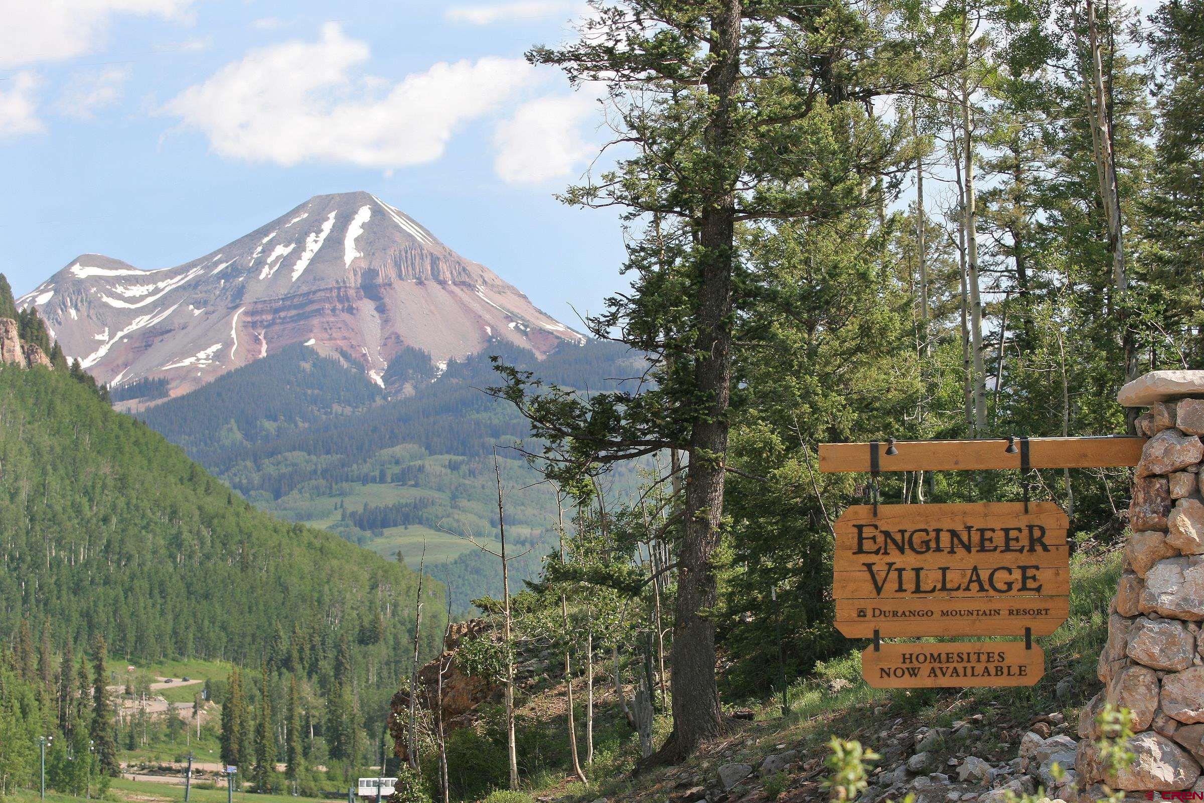 245 Engineer Drive Durango, CO 81301 - Photo 21 of 28 a view of a street sign under a large tree