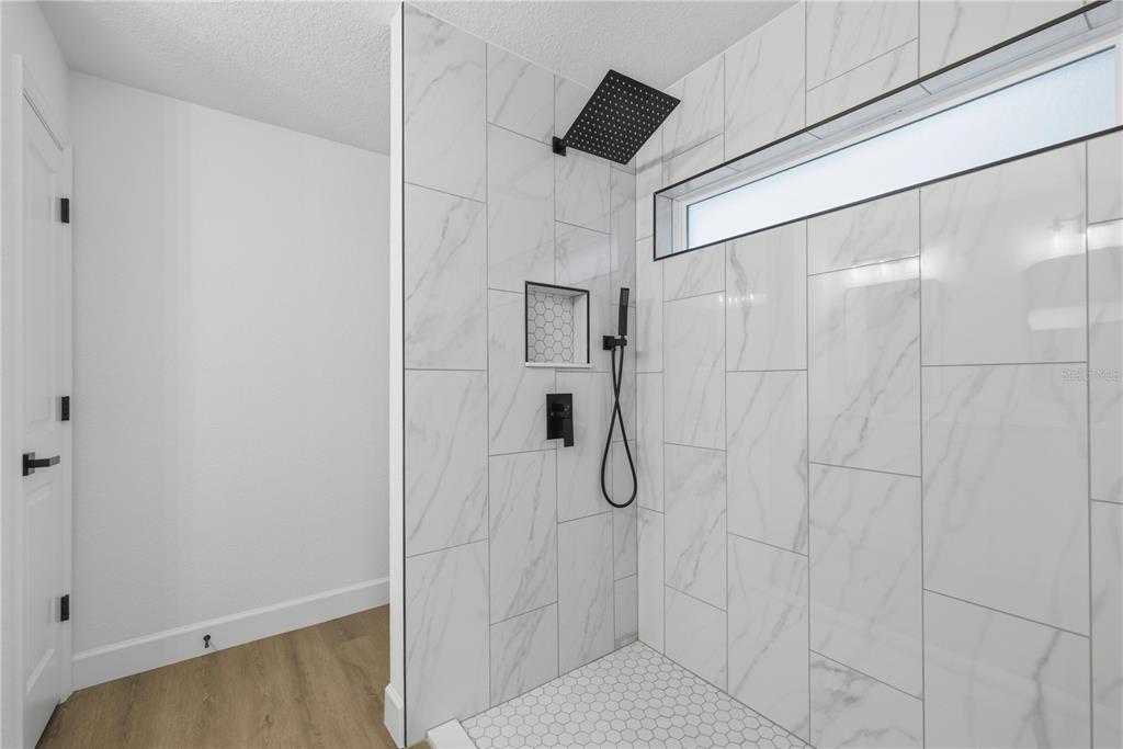 23 Juniper Loop Court Ocala, FL 34480 - Photo 11 of 25 a bathroom with a shower and a shower