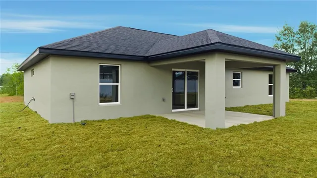 a house with yard in front of it