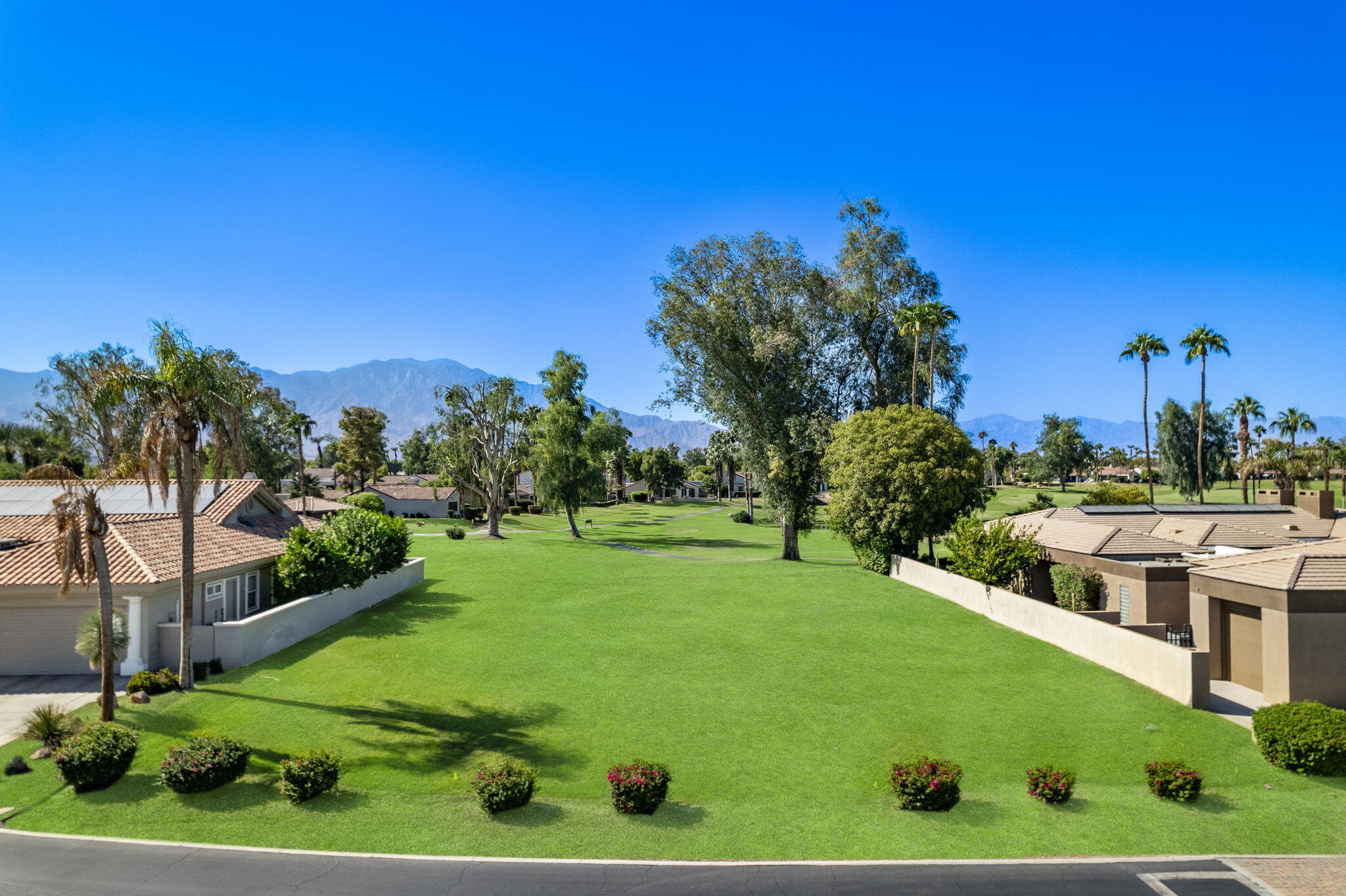 12102 Turnberry Drive Rancho Mirage, CA 92270 - Photo 11 of 28 a view of a garden with a house