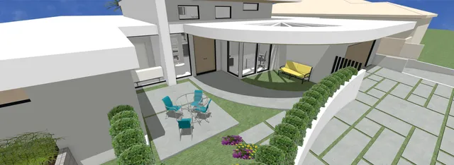 a front view of a house with a garden