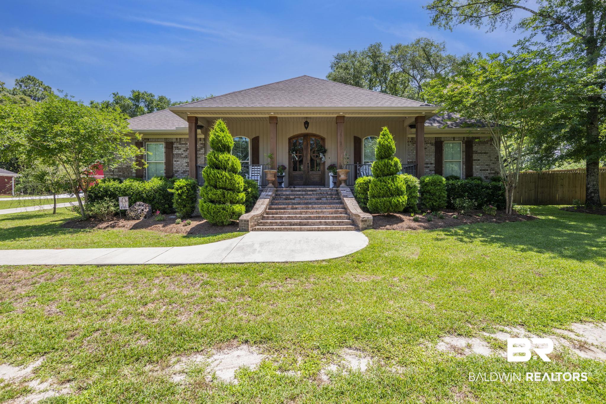 4331 Hamilton Oaks Lane Mobile, AL 36695 - Photo 1 of 38 View of front of home with french doors, stairs, a shingled roof, and covered porch
