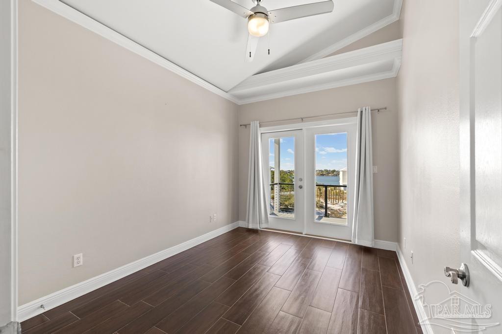 321 Gulfview Lane Perdido Key, FL 32507 - Photo 30 of 57 wooden floor in an empty room with a window