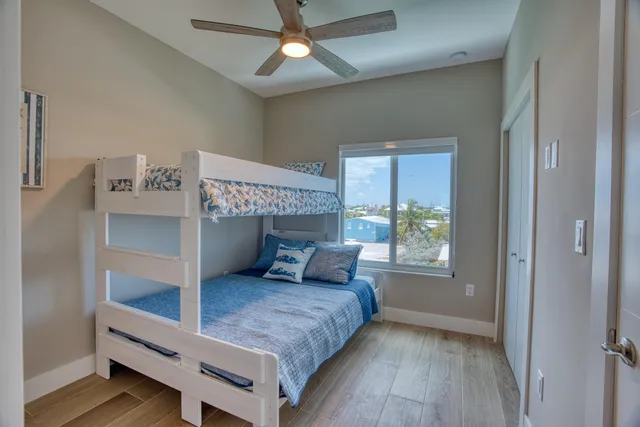 a front view of a house with sitting space