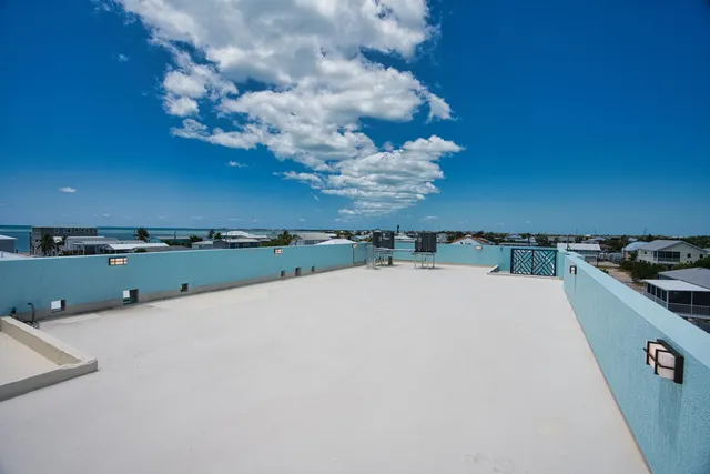 a view of balcony and yard