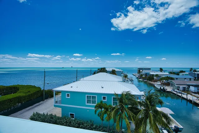 a view of a building with a tree