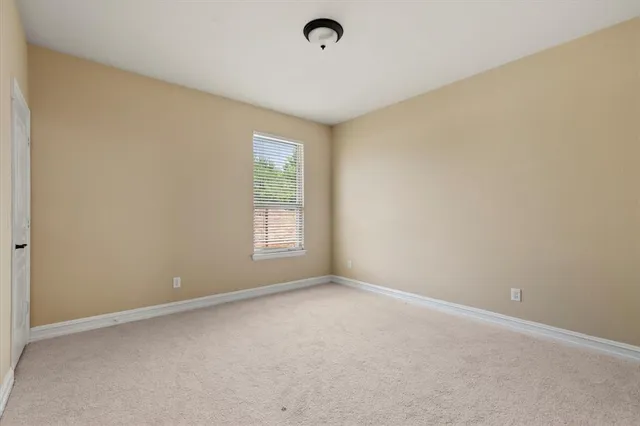 a bathroom with a double vanity sink toilet and shower