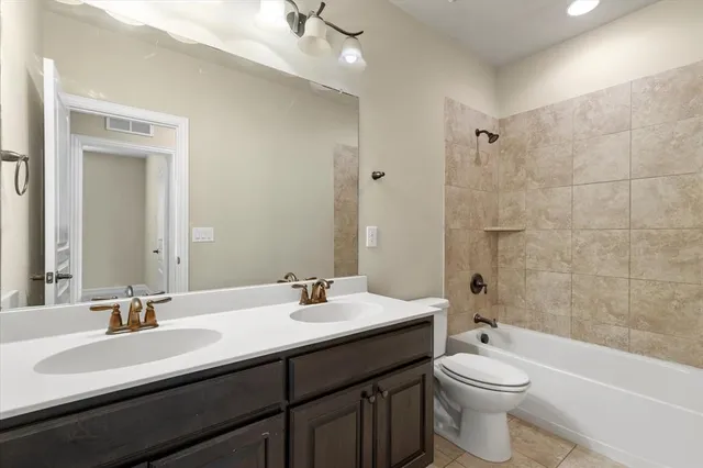 an empty room with a empty space and windows