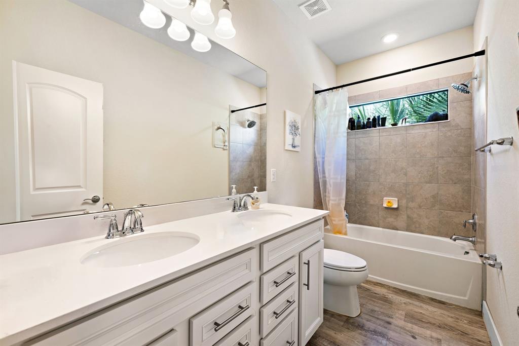2178 Appleton Circle South Oakland Park, FL 33309 - Photo 10 of 22 a bathroom with a sink a toilet and shower