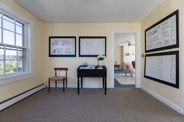 a view of a livingroom with furniture and window