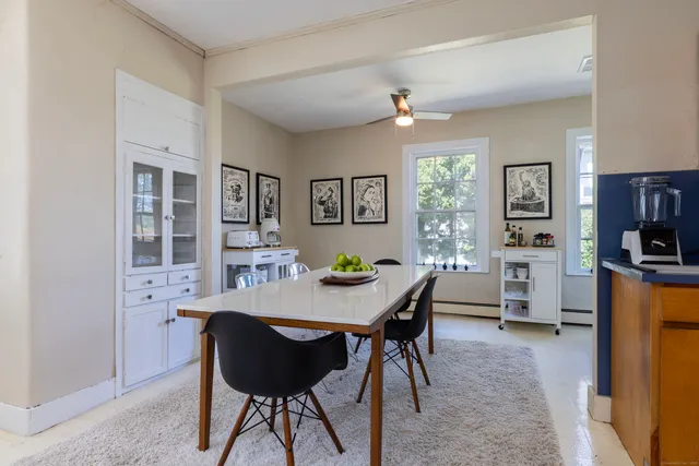 a view of a dining room with furniture