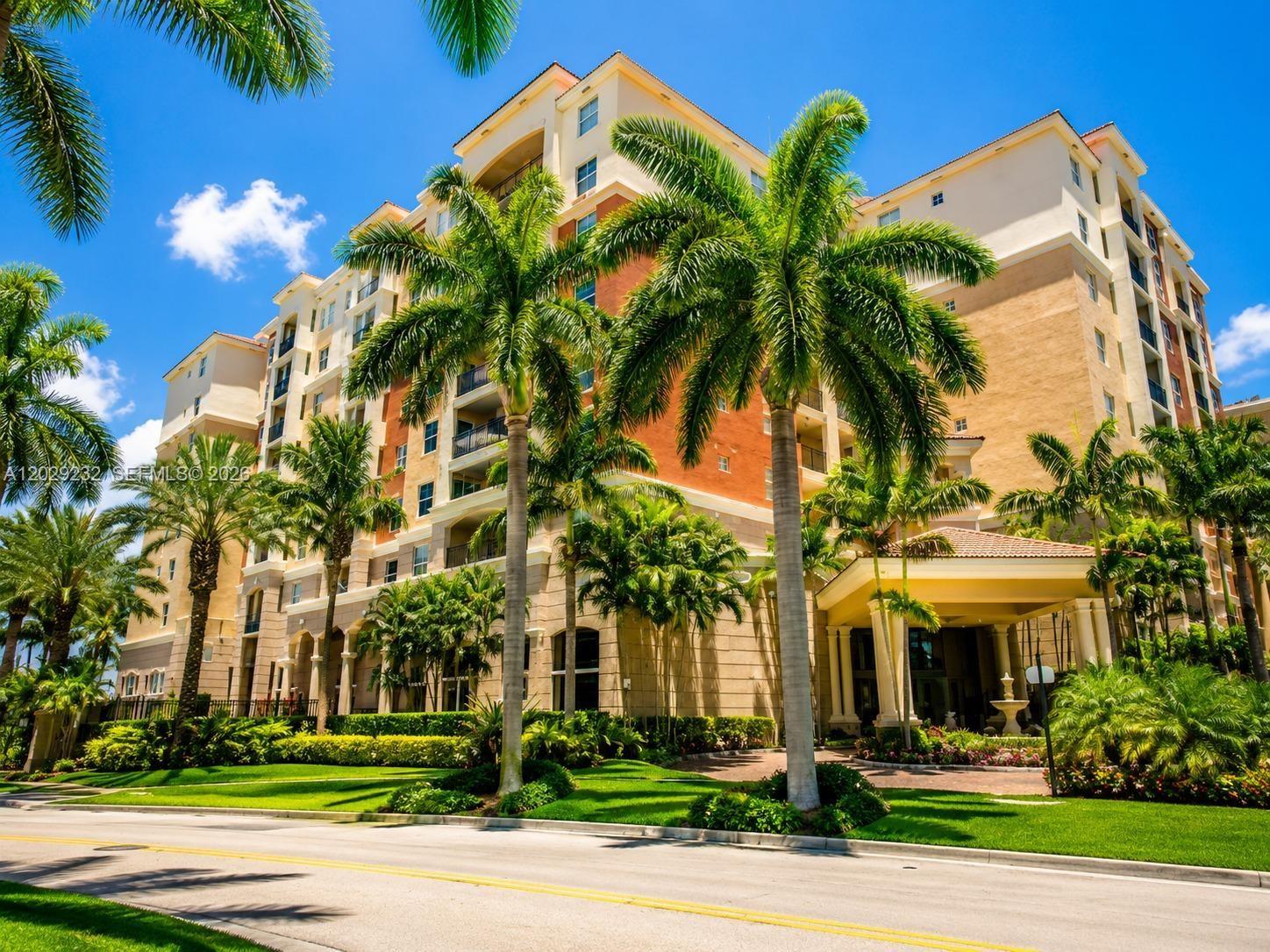 17100 North Bay Road, Unit 1605 Sunny Isles Beach, FL 33160 - Photo 27 of 52 a view of a building with a yard and potted plants