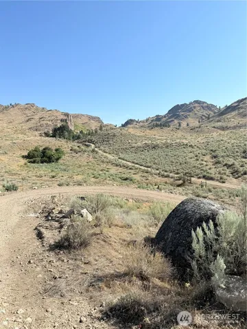a view of mountain view with trees