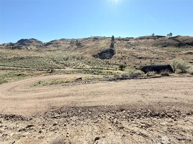 a view of mountain view with mountains in the background