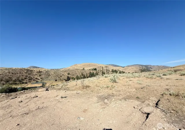 a view of ocean and mountain