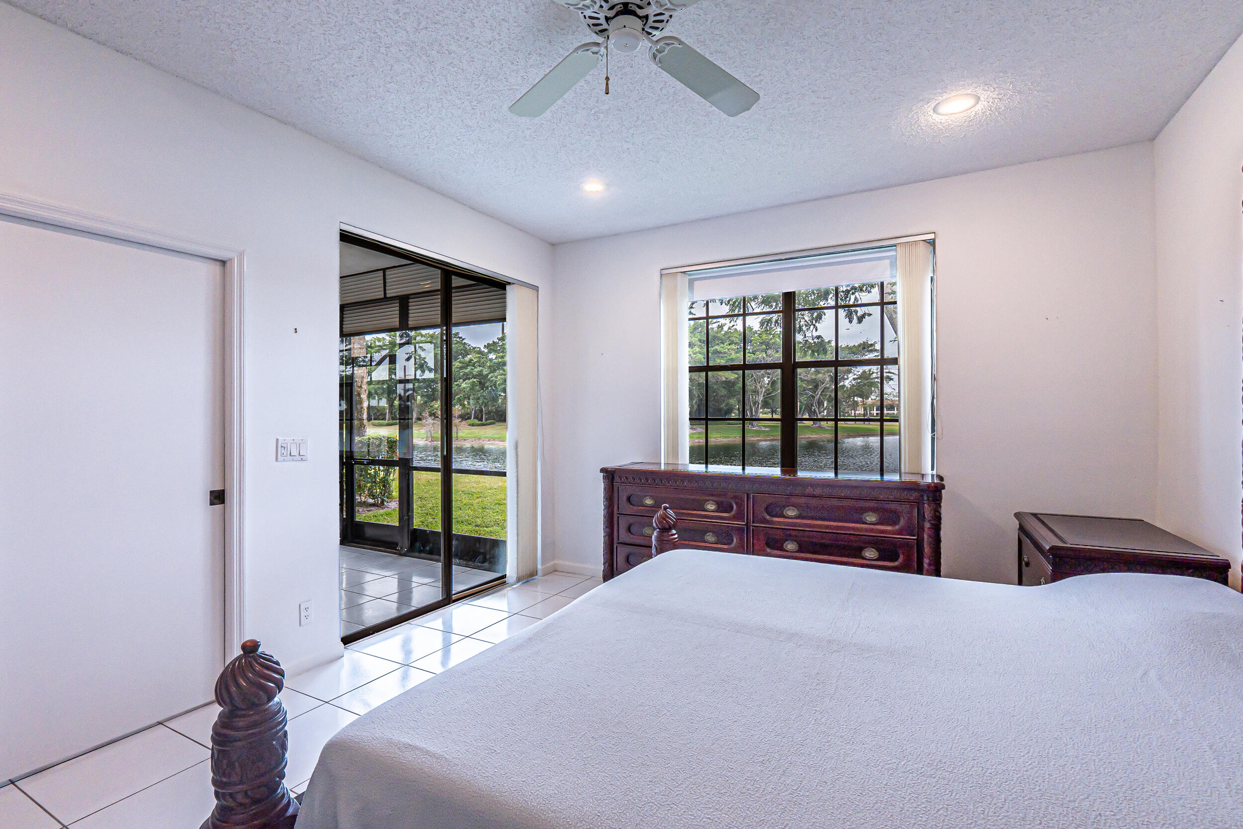 22791 Trelawny Terrace, Unit A Boca Raton, FL 33433 - Photo 13 of 32 Primary Bedroom