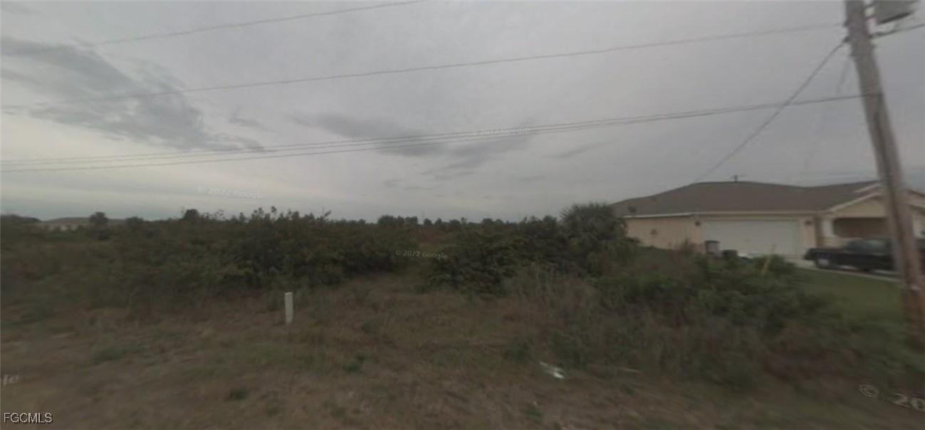 a view of a yard in front of a house