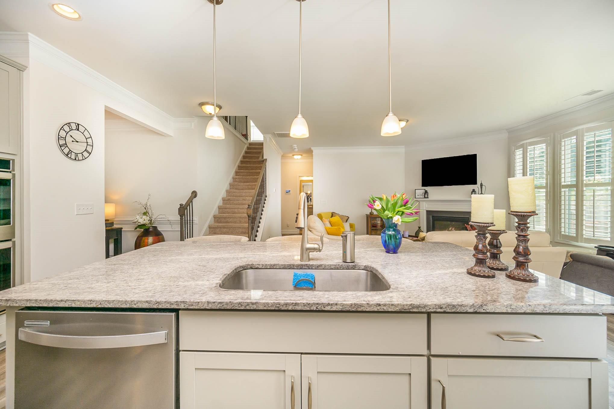 6029 Redwood Pine Road Concord, NC 28027 - Photo 14 of 48 a bathroom with a granite countertop sink and a mirror