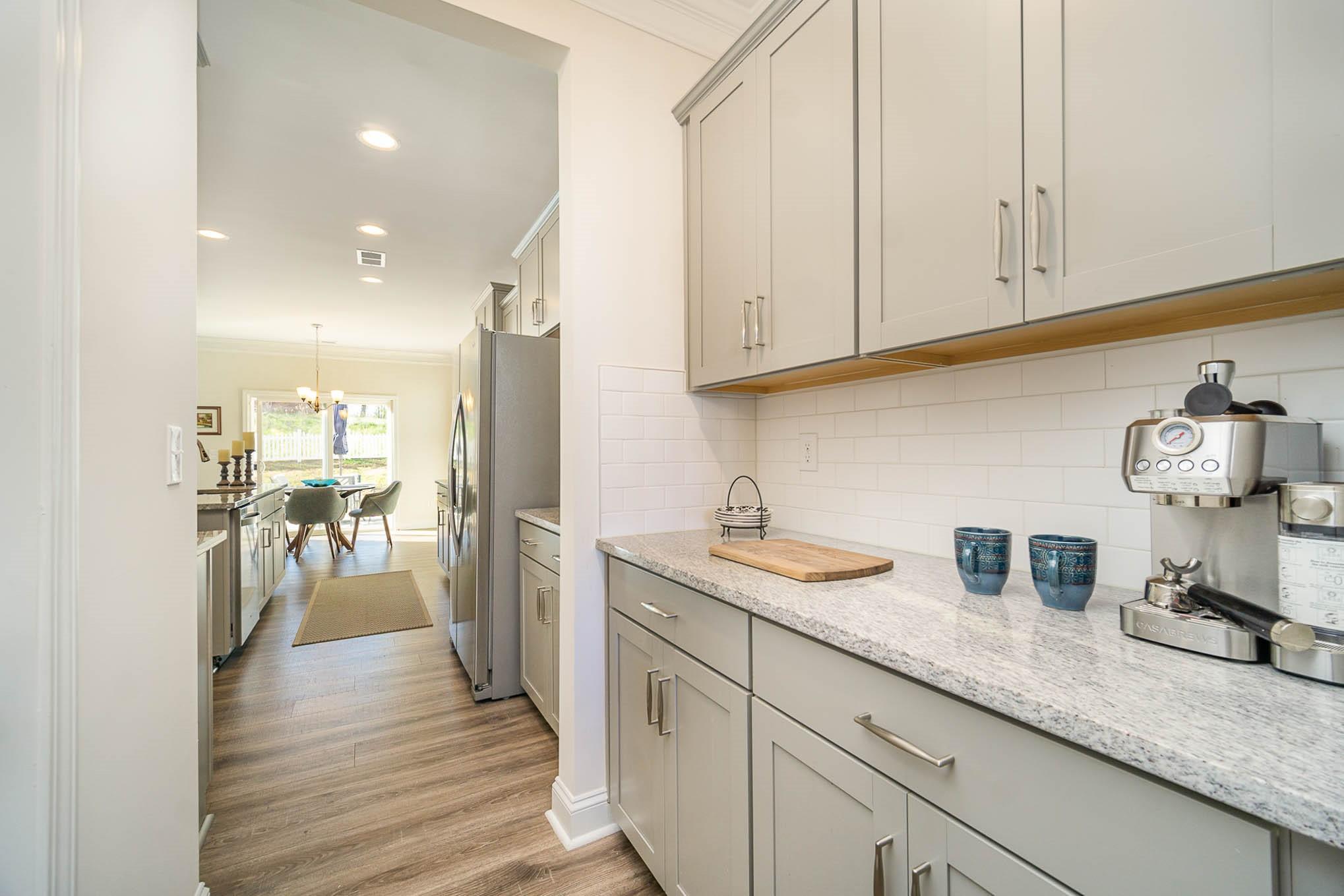 6029 Redwood Pine Road Concord, NC 28027 - Photo 16 of 48 a kitchen with sink cabinets and appliances