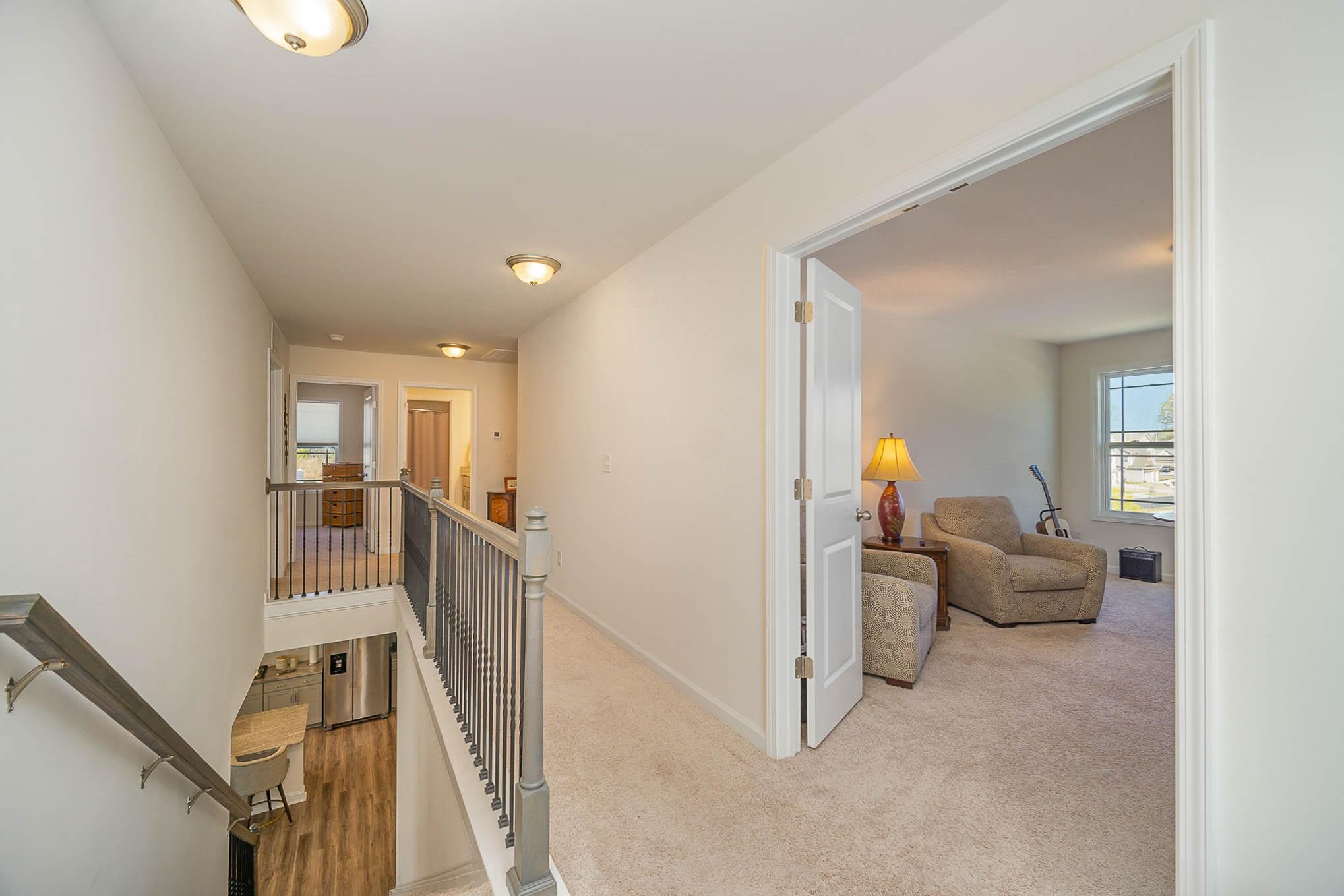 6029 Redwood Pine Road Concord, NC 28027 - Photo 18 of 48 a view of entryway and livingroom with furniture