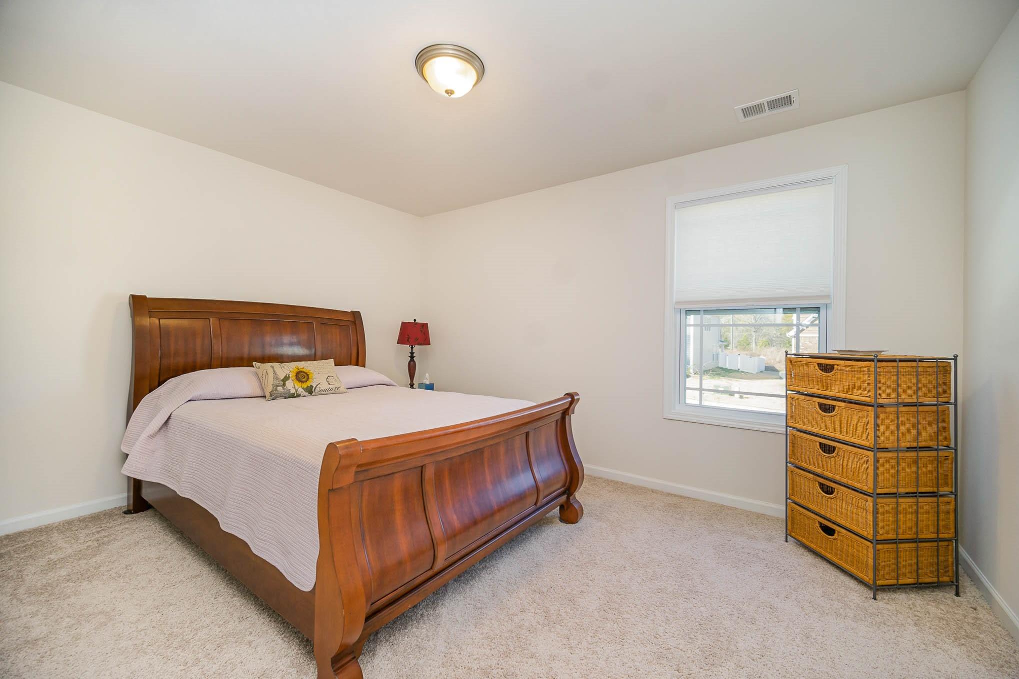 6029 Redwood Pine Road Concord, NC 28027 - Photo 28 of 48 a bedroom with a bed and a window