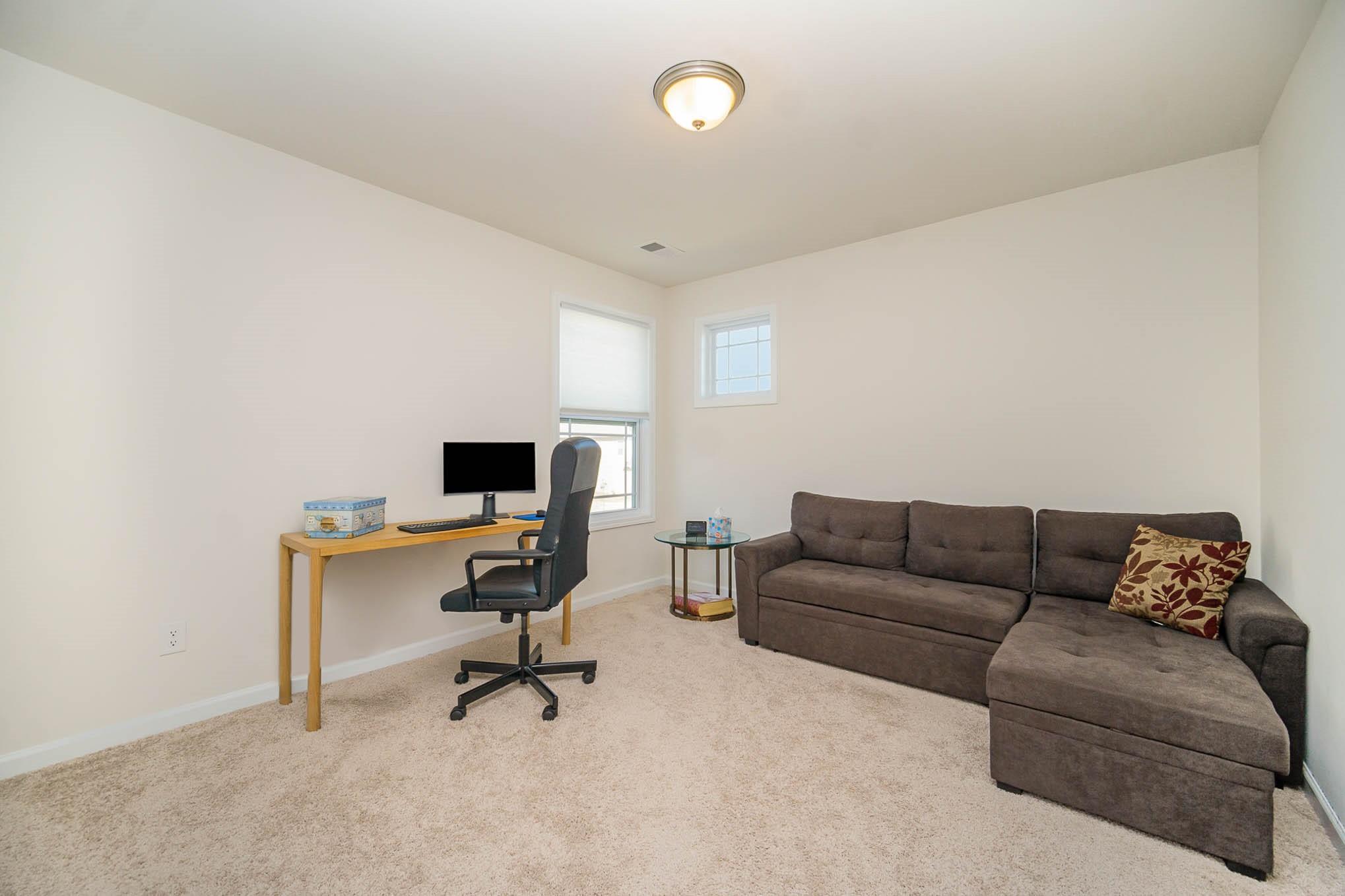 6029 Redwood Pine Road Concord, NC 28027 - Photo 30 of 48 a living room with furniture and a window