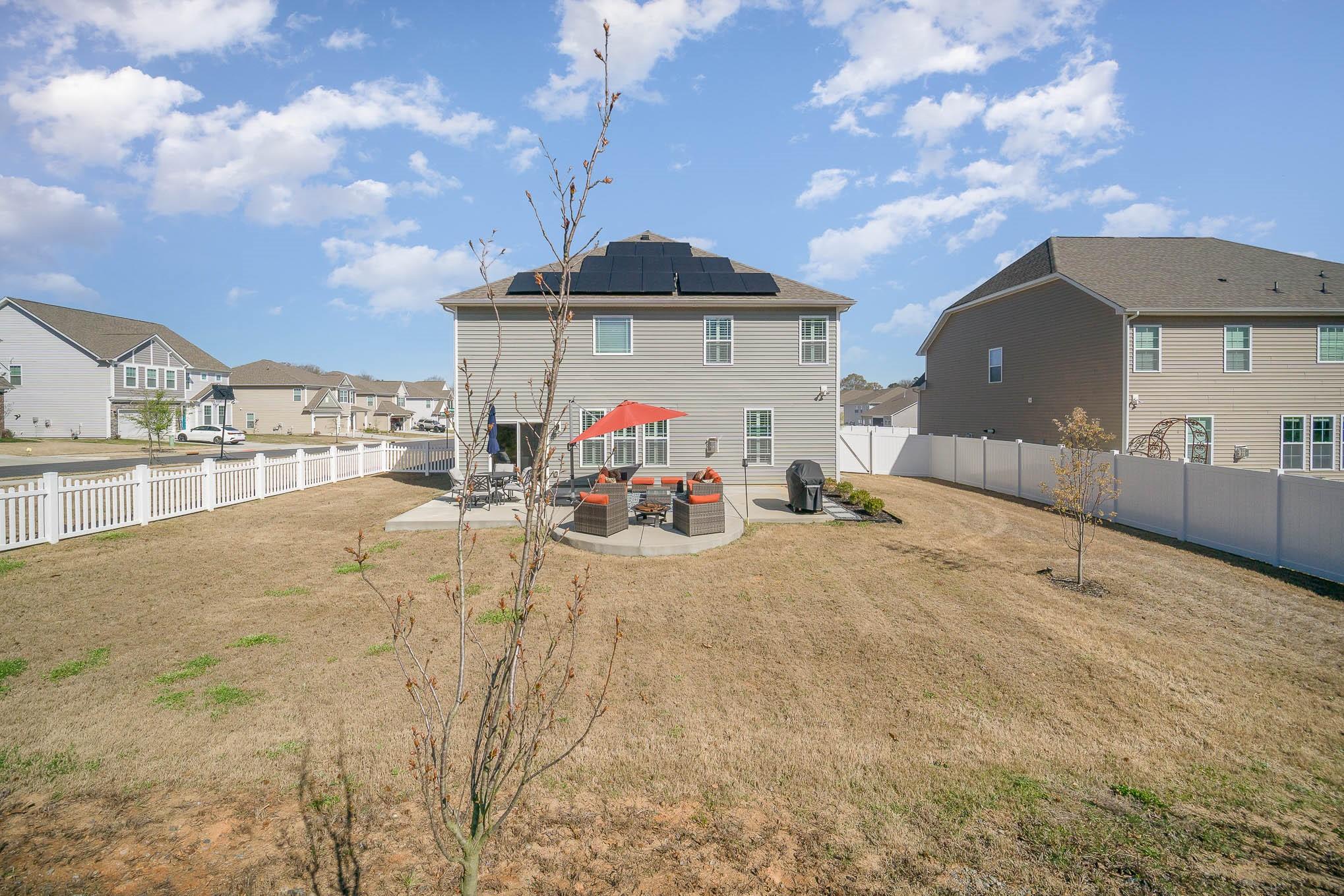6029 Redwood Pine Road Concord, NC 28027 - Photo 39 of 48 a view of a terrace with a barbeque