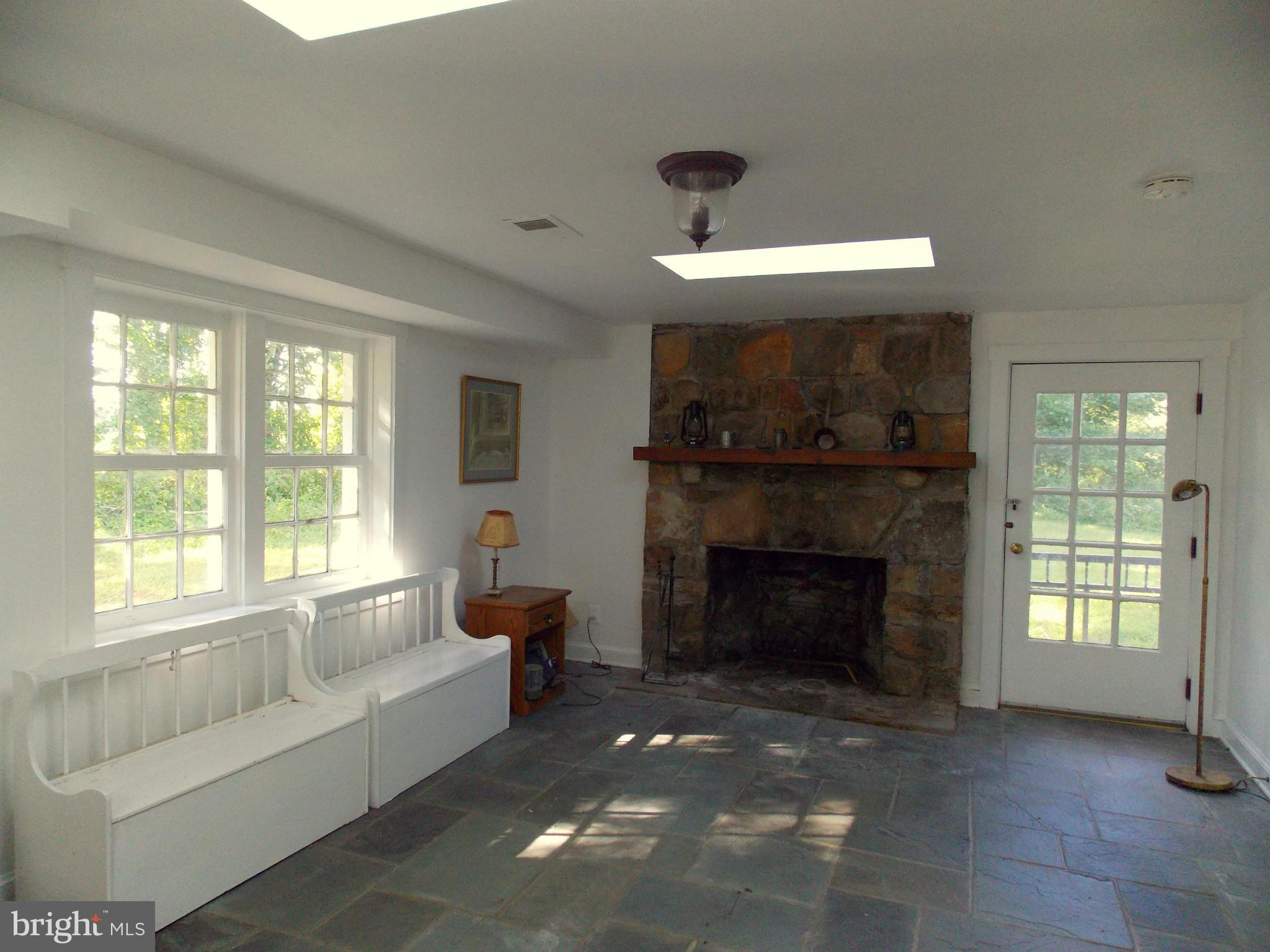 7032 Olinger Road Marshall, VA 20115 - Photo 5 of 19 Family Room w/ wood-burning Fireplace