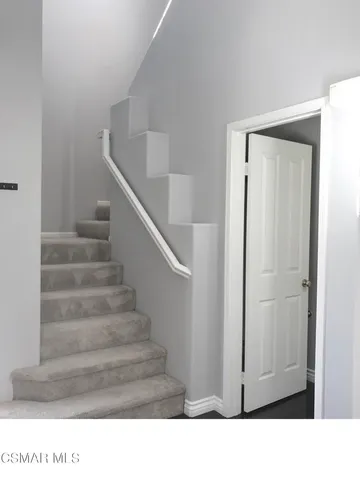 a black and white photo of a house