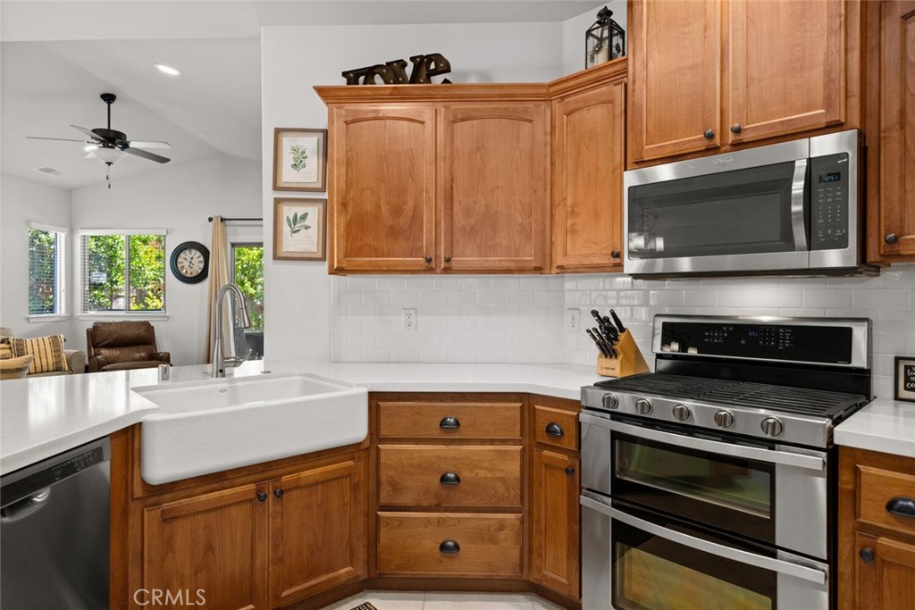 2816 Levi Lane Chico, CA 95973 - Photo 12 of 35 a kitchen with stainless steel appliances a stove microwave and sink