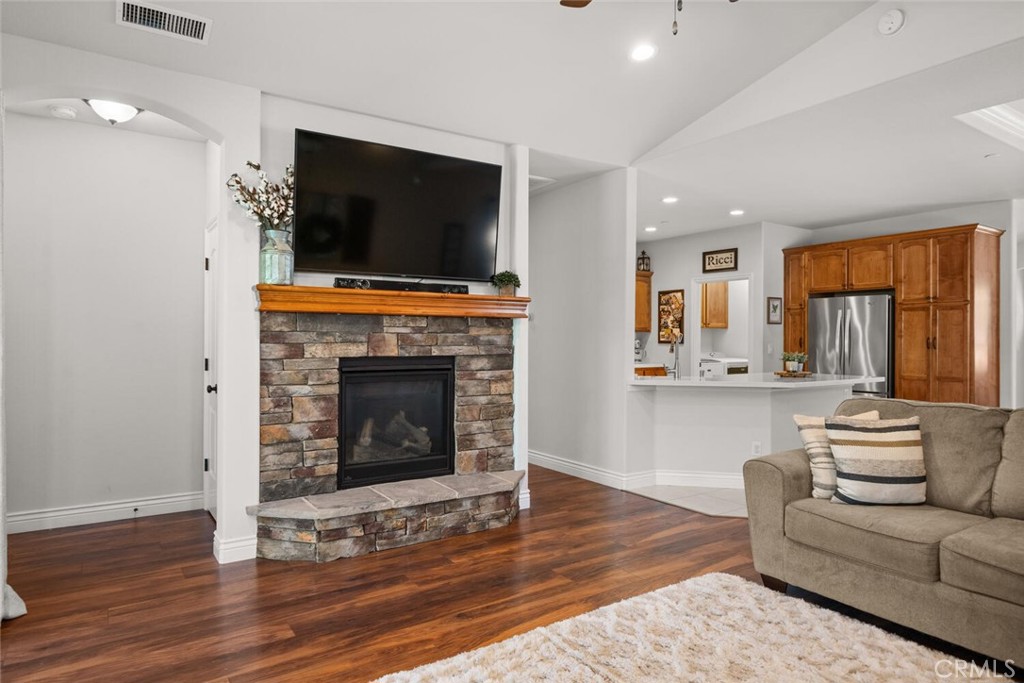 2816 Levi Lane Chico, CA 95973 - Photo 14 of 35 a living room with fireplace and a flat screen tv