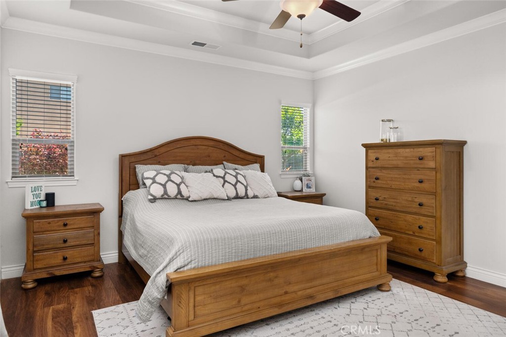 2816 Levi Lane Chico, CA 95973 - Photo 17 of 35 a bedroom with a bed and a dresser