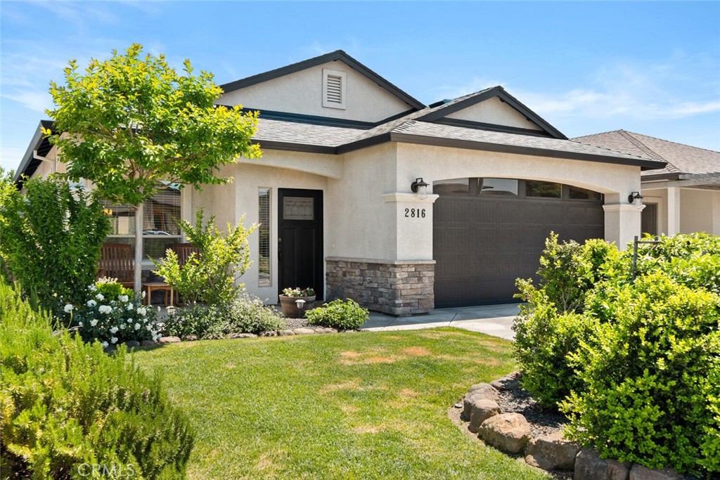 2816 Levi Lane Chico, CA 95973 - Photo 2 of 35 a front view of a house with garden