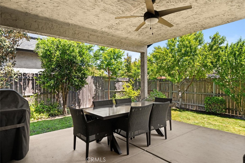 2816 Levi Lane Chico, CA 95973 - Photo 26 of 35 a view of a patio with a table chairs and a backyard
