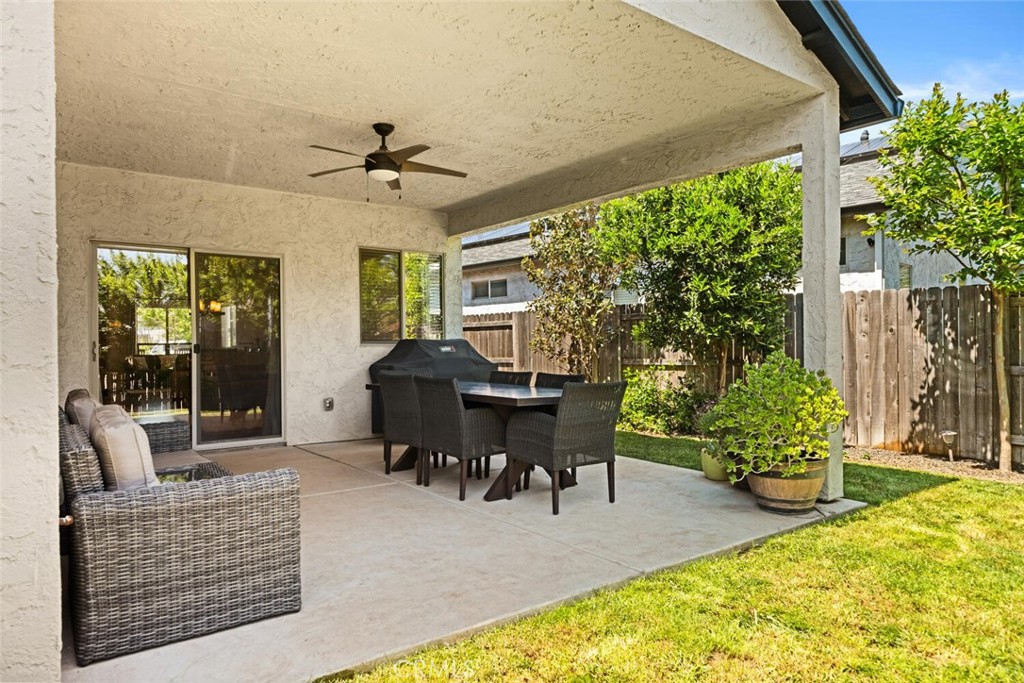 2816 Levi Lane Chico, CA 95973 - Photo 30 of 35 a living room with furniture and a potted plant