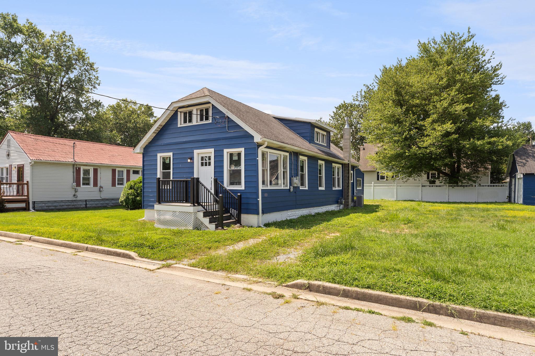 a view of a house with swimming pool and porch