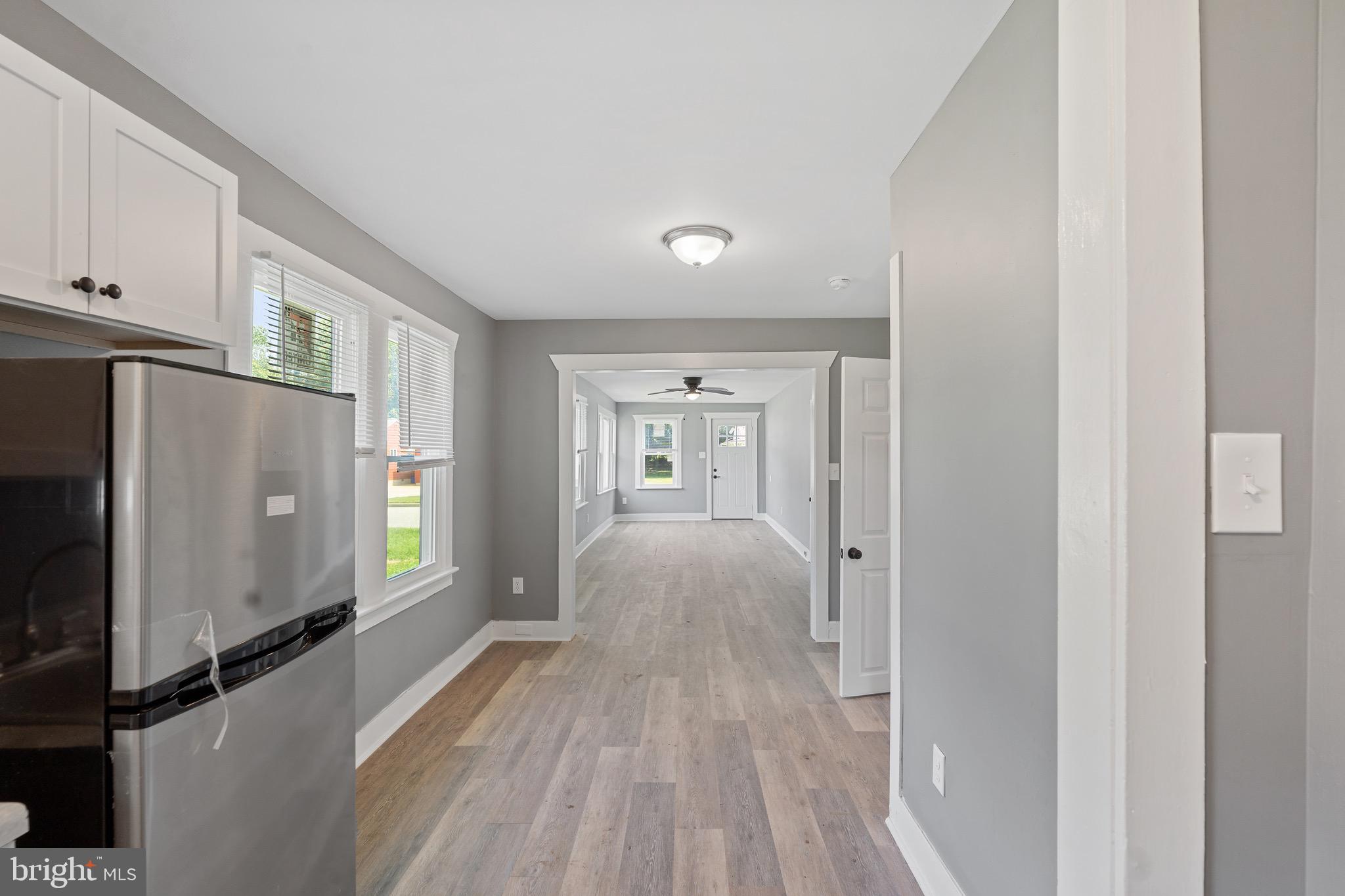 109 Georgia Road Pennsville, NJ 08070 - Photo 22 of 40 a view of hallway with wooden floor