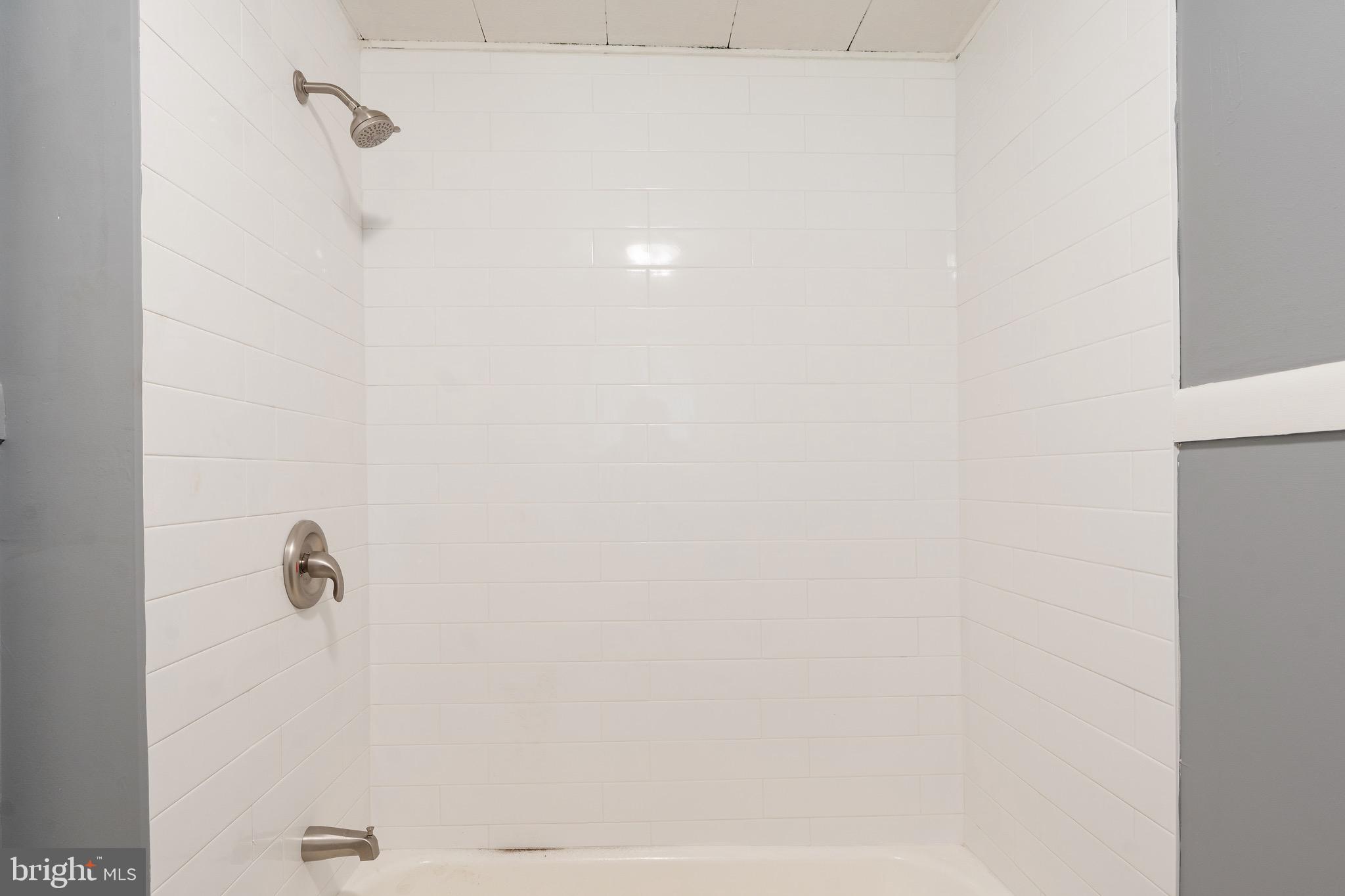 109 Georgia Road Pennsville, NJ 08070 - Photo 24 of 40 a bathroom with a shower