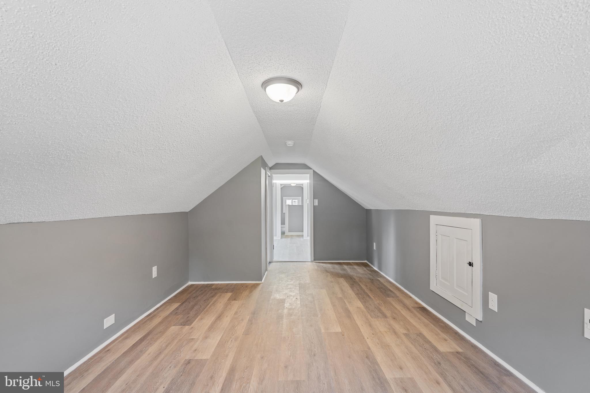 109 Georgia Road Pennsville, NJ 08070 - Photo 26 of 40 a view of empty room with wooden floor