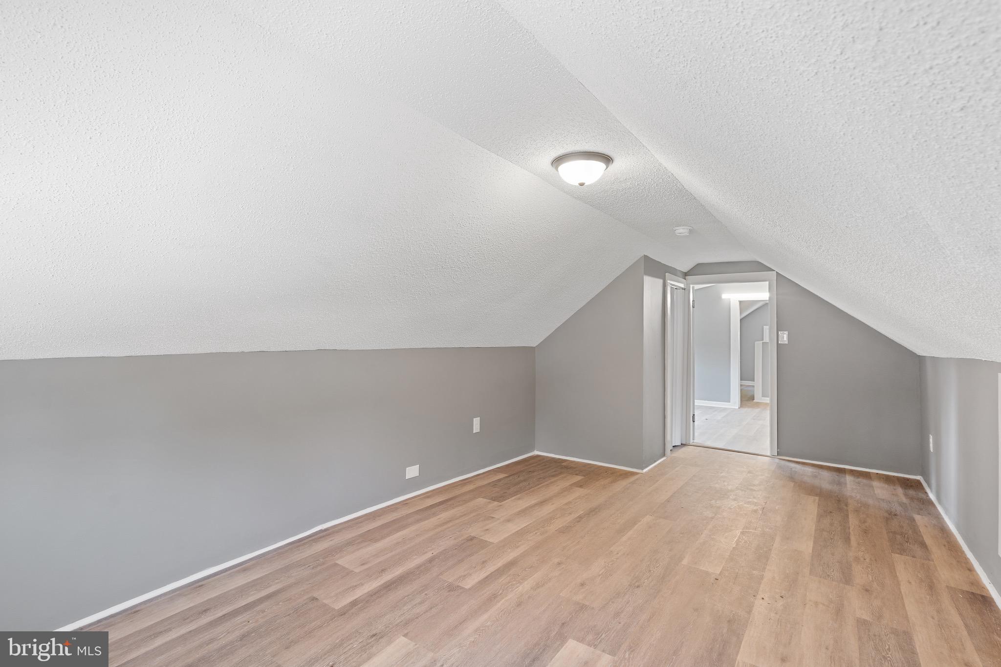 109 Georgia Road Pennsville, NJ 08070 - Photo 27 of 40 a view of empty room with wooden floor