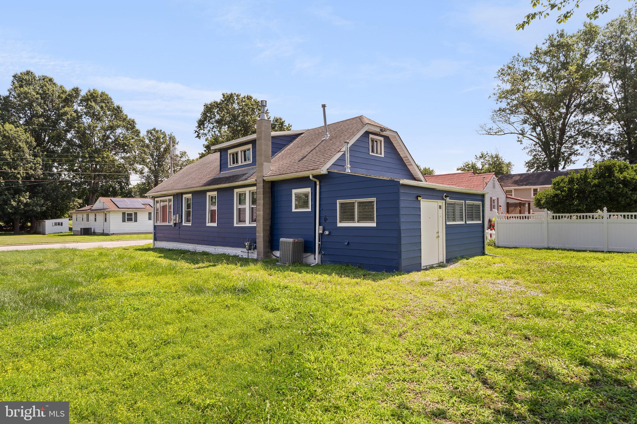 109 Georgia Road Pennsville, NJ 08070 - Photo 34 of 40 a front view of a house with yard and green space