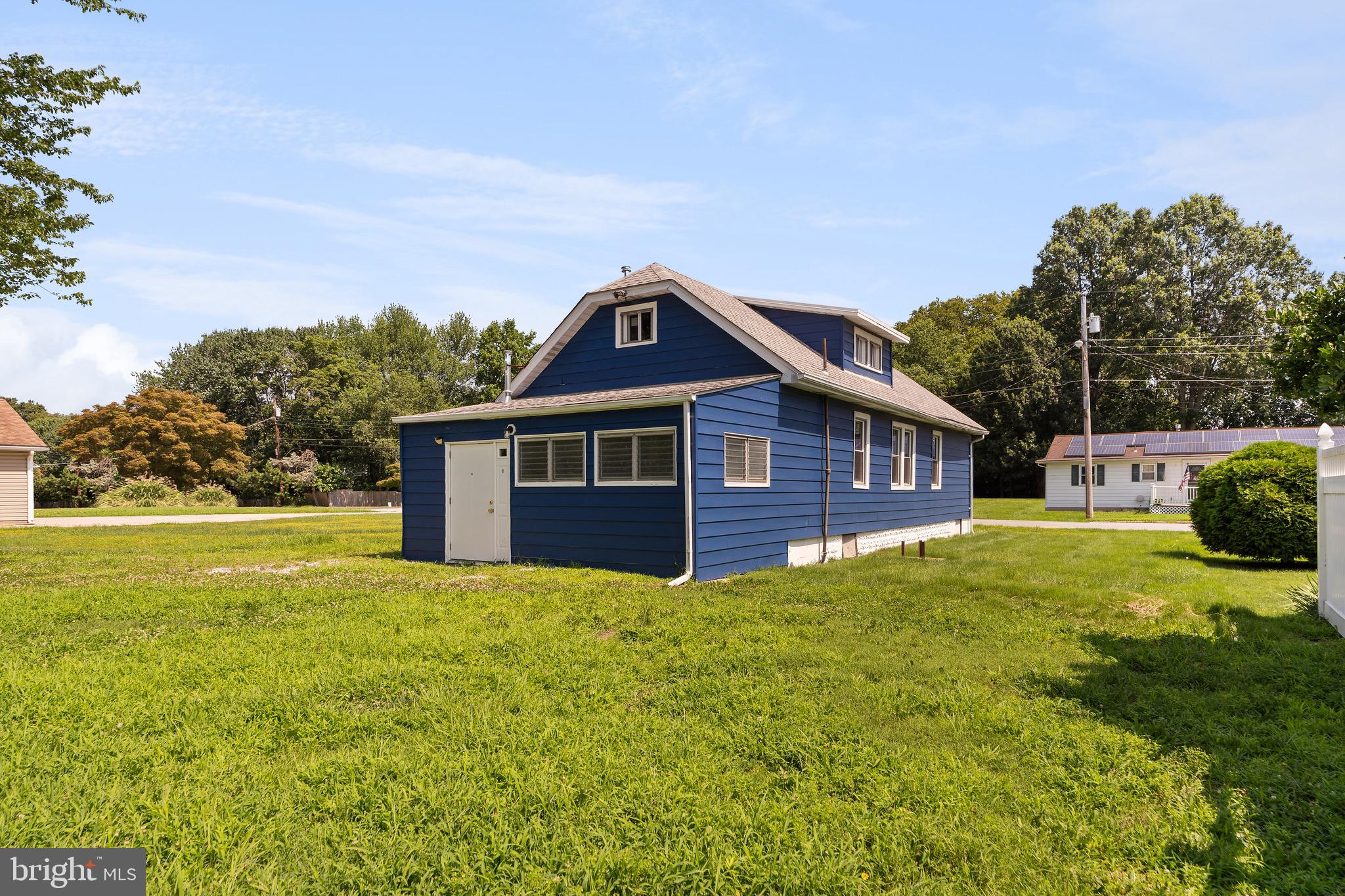 109 Georgia Road Pennsville, NJ 08070 - Photo 36 of 40 a front view of a house with yard